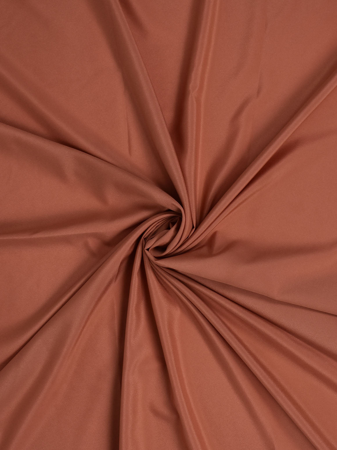 Salmon pink polyester crepe